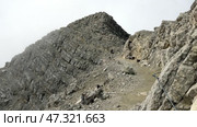 Доломитовые Альпы. Кортина д'Ампеццо. Вершина горы Тофана. Июль. Dolomites. Cortina d'Ampezzo. The top of Mount Tofana. July. Стоковое видео, видеограф Горшков Александр / Фотобанк Лори