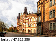 Landscape of Yuzhny Val Street in Vyborg with the old building of Leningrad State University. Стоковое фото, фотограф Владимир Ушаров / Фотобанк Лори