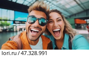 A cheerful couple poses for a selfie at the airport, both smiling widely and displaying excitement for their travel plans. They carry backpacks and seem ready for adventure. Стоковое AI-видео, аниматор Sergey Grishin / Фотобанк Лори