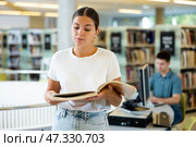 Intelligent Caucasian girl hold academic books. Стоковое фото, фотограф Яков Филимонов / Фотобанк Лори