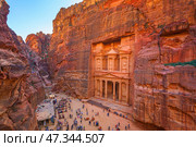 Petra, Wadi Musa, Jordan - Mar 06 2023, aerial view of Al-Khazneh tomb, symbol of the city of Petra, Wadi Musa, Jordan. Стоковое фото, фотограф Сергей Богомяко / Фотобанк Лори