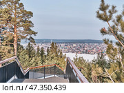 Scenic Winter View of Sysert Town and Pond from Bessonova Mountain Observation Deck, Russia. Стоковое фото, фотограф Ирина Кононова / Фотобанк Лори
