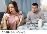 Sick woman resting at home with husband. Стоковое фото, фотограф Яков Филимонов / Фотобанк Лори