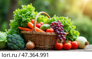 A wicker basket overflowing with vibrant vegetables and fruits sits on a wooden surface. The arrangement includes lettuce, tomatoes, carrots, grapes, and broccoli, illuminated by soft sunlight. Стоковое AI-изображение, AI-художник Sergey Grishin / Фотобанк Лори