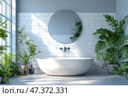 A bright, modern bathroom with an oval freestanding bathtub. The wall behind the bathtub is lined with white rectangular tiles, and a large round mirror hangs above the bathtub. The room is filled with natural light coming through a large window on the left. The interior is decorated with many green indoor plants, which gives the space a feeling of freshness, coziness and connection with nature. The bathtub and the surrounding space are decorated in a minimalist, but warm and lively style. Стоковое AI-изображение, AI-художник Анна Кривицкая / Фотобанк Лори