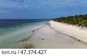 Aerial view of beautiful tropical sandy beach. Стоковое фото, фотограф Михаил Коханчиков / Фотобанк Лори