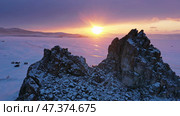 Shaman rock in frozen lake Baikal. Стоковое фото, фотограф Михаил Коханчиков / Фотобанк Лори
