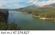 Aerial view beautiful nature with mountains and hills by Lake Mattupetty. Kerala State. Near the city of Munar. Стоковое фото, фотограф Mikhail Davidovich / Фотобанк Лори