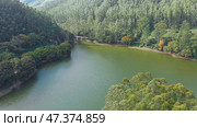 Aerial view beautiful nature with mountains and hills by Lake Mattupetty. Kerala State. Near the city of Munar. Стоковое фото, фотограф Mikhail Davidovich / Фотобанк Лори