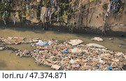 Dirty river in Dharavi slums. Mumbai. India. Стоковое фото, фотограф Mikhail Davidovich / Фотобанк Лори