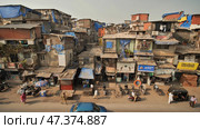 Mumbai, India - December 17, 2018 Dharavi slums in east Mumbai. Bandra District, Maharashtra, India. Редакционное фото, фотограф Mikhail Davidovich / Фотобанк Лори