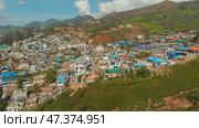 Aerial view residential districts Vatanappally and New Colonny city Munnar. Kerala. India. Стоковое фото, фотограф Mikhail Davidovich / Фотобанк Лори