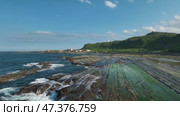 The Magang tidal zone in Taiwan. This is one of the littoral zones of the country with a rich coastline ecology and the largest number of green algae. Стоковое видео, видеограф  Сергей Фомин / Фотобанк Лори