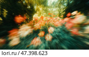 Vibrant flowers bloom amidst soft greenery in a sunlit garden pathway. Красочные цветы плавно покачиваются в пышном саду, залитом теплым солнечным светом. Яркие оттенки и размытое движение создают сказочную атмосферу, приглашая зрителей оценить красоту природы. Стоковое AI-изображение, AI-художник Katsiaryna Repich / Фотобанк Лори