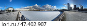 MINSK, BELARUS, FEBRUARY 20, 2025 The embankment of the Svislach River in the Nemiga area in winter. Panoramic shot. Редакционное фото, фотограф Vadzim Yakubovich / Фотобанк Лори