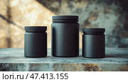 Blank supplement containers in varying sizes arranged on a textured surface. Пустые контейнеры для добавок разного размера, расположенные на текстурированной поверхности. Стоковое AI-изображение, AI-художник Katsiaryna Repich / Фотобанк Лори