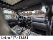 KRASNOYARSK, RUSSIA - December 13, 2024: Silver Toyota RAV4. Редакционное фото, фотограф Плотников Дмитрий / Фотобанк Лори