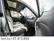 KRASNOYARSK, RUSSIA - December 13, 2024: Silver Toyota RAV4. Редакционное фото, фотограф Плотников Дмитрий / Фотобанк Лори