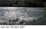 Река Рейн в городе Шаффхаузен. Швейцария. Май. The Rhine River in the city of Schaffhausen. Switzerland. May. Стоковое видео, видеограф Горшков Александр / Фотобанк Лори