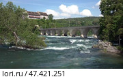 Река Рейн и мост в городе Шаффхаузен. Швейцария. Май. Rhine river and bridge in the city of Schaffhausen. Switzerland. May. Стоковое видео, видеограф Горшков Александр / Фотобанк Лори