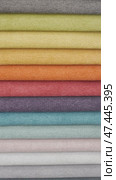 Close-up of a palette of textile abstract stripes of different colors. Colorful fabric samples in a textile shop. Стоковое видео, видеограф Дмитрий Нечаев / Фотобанк Лори