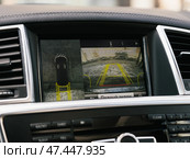 Novosibirsk, Russia -  March  23, 2024: Mercedes-Benz GL-class, reverse camera with monitor,buttons - details and controls of modern car. Стоковое фото, фотограф Виталий Сова / Фотобанк Лори