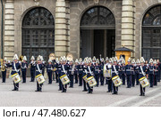 STOCKHOLM, SWEDEN - APRIL 30, 2018: Military musicians from the Royal Swedish Army Orchestra perform at the ceremony to celebrate the 72nd birthday of King Carl XVI Gustaf at the Royal Palace in Stockholm. Редакционное фото, фотограф Сергей Комаров / Фотобанк Лори