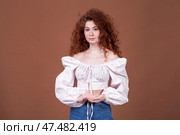 Studio portrait of a red-haired girl. Стоковое фото, фотограф Андрей Аркуша / Фотобанк Лори