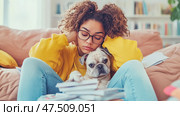 Burdened Student with Companion: Studying Overload with a Loving Dog. Стоковое AI-изображение, AI-художник Данила Большаков / Фотобанк Лори
