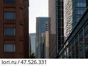 Skyscrapers of the Marunouchi business district in Chiyoda Ward on Marunouchi 3rd street on a sunny day, Tokyo, Japan. Стоковое фото, фотограф Ula Ulachka / Фотобанк Лори
