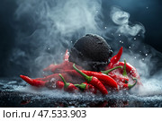 Charcoal ice cream served on spicy red chili peppers with steam rising. Уникальный десерт сочетает в себе угольное мороженое и ярко-красный перец чили, создавая интригующий визуальный эффект. От блюда поднимается дым, усиливая эффектность презентации. Стоковое AI-изображение, AI-художник Katsiaryna Repich / Фотобанк Лори