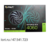Close up of PALIT Geforse RTX 4060 DUAL 8GB. Computer graphic card isolated on a white background. Редакционное фото, фотограф Васильева Юлия / Фотобанк Лори