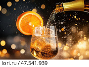 A vibrant Aperol Spritz in motion with juicy orange slices and glistening ice cubes. Prosecco flows into the concoction, capturing the essence of this refreshing Italian cocktail. Стоковое AI-изображение, AI-художник Nart / Фотобанк Лори