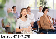 In audience, students sit staring at teacher and listen to lecture. Стоковое фото, фотограф Яков Филимонов / Фотобанк Лори