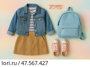 Stylish Outfit Flat Lay Featuring Denim Jacket, Striped Shirt, and Accessories Perfect for Casual Outings. Стоковое AI-изображение, AI-художник Юлия Гапеенко / Фотобанк Лори