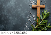 Ash Wednesday Observance With Cross, Ashes, and Olive Leaves on Dark Stone Background Emphasizing Reflection and Renewal. Стоковое AI-изображение, AI-художник Sergey Grishin / Фотобанк Лори