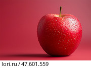 Сочное красное яблоко на красном фоне. Стоковое AI-изображение, AI-художник Ольга Беляева / Фотобанк Лори