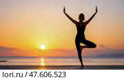 A woman doing yoga, stretching, pacification, calmness. Стоковое AI-изображение, AI-художник Ирина Ручушкина / Фотобанк Лори