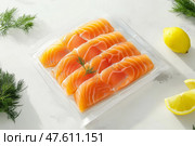 Vacuum-sealed salmon fillets ready for cooking and preserving freshness. Филе лосося в вакуумной упаковке, готовое к приготовлению и сохраняющее свежесть. Стоковое AI-изображение, AI-художник Katsiaryna Repich / Фотобанк Лори