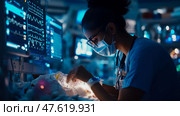 Intensive Care: A Nurse's Vigil, Caring for a Neonate Under the Watchful Gaze of Monitors, an image about dedication and care in a hospital, for print and awareness. Стоковое AI-изображение, AI-художник Данила Большаков / Фотобанк Лори
