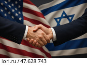 Дружеское рукопожатие. Рукопожатие на фоне флагов США и Израиля, символизирующее дружбу и сотрудничество. Стоковое AI-изображение, AI-художник Башкирова Анна / Фотобанк Лори