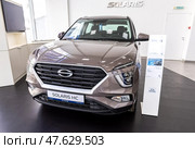Новая модель Solaris HC представлена ​​в автосалоне официального дилера. Редакционное фото, фотограф FotograFF / Фотобанк Лори