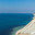 Beautiful sunny scenic landscape of Black Sea coast at summer. Seaside scenery with sea bottom viewed through clear blue water and steep rocky cliff on foreground. Стоковое фото, фотограф Ирина Михайличенко / Фотобанк Лори
