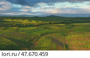Tuscany aerial sunrise farmland hill landscape (2023 год). Стоковое видео, видеограф Михаил Коханчиков / Фотобанк Лори