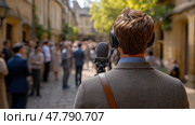 A man stands with a microphone, providing commentary as guests mingle in a charming outdoor setting filled with greenery and historic architecture. Стоковое AI-изображение, AI-художник Данила Большаков / Фотобанк Лори