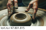 Skillful pottery crafting: hands shaping clay on a spinning wheel. Стоковое AI-видео, аниматор Sabyna75 / Фотобанк Лори