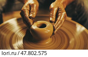Hands shaping clay on pottery wheel: craftsmanship and artistry in motion. Стоковое AI-видео, аниматор Sabyna75 / Фотобанк Лори