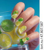 Creative nail art featuring vibrant lemon and lime designs on manicured hands. Креативный нейл-арт с яркими рисунками лимона и лайма на ухоженных руках. Стоковое AI-изображение, AI-художник Katsiaryna Repich / Фотобанк Лори