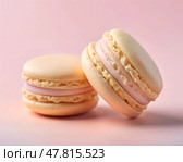 Two pastel macarons rest side by side on a gentle pink background, exhibiting a creamy filling and a tender, airy shell that tempt the senses with their sweetness. Стоковое AI-изображение, AI-художник Ольга Игнашина / Фотобанк Лори