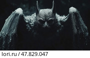 A dark, ominous figure resembling a bat stands imposingly against a shadowy backdrop, evoking an unsettling atmosphere at night. Стоковое AI-изображение, AI-художник Данила Большаков / Фотобанк Лори